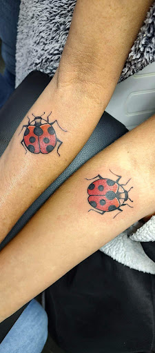 Explore father and son tattoo ideas, creative tattoo ideas in Nevada, available at Generation X Tattoos and Piercings