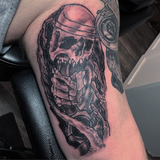 Explore colorful sleeve tattoo ideas, creative tattoo ideas in Jonesboro, available at Gallery Of Ink Tattoo Shop