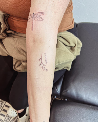 Explore motorbike tattoo ideas, creative tattoo ideas in Burley, available at Fine Line Ink