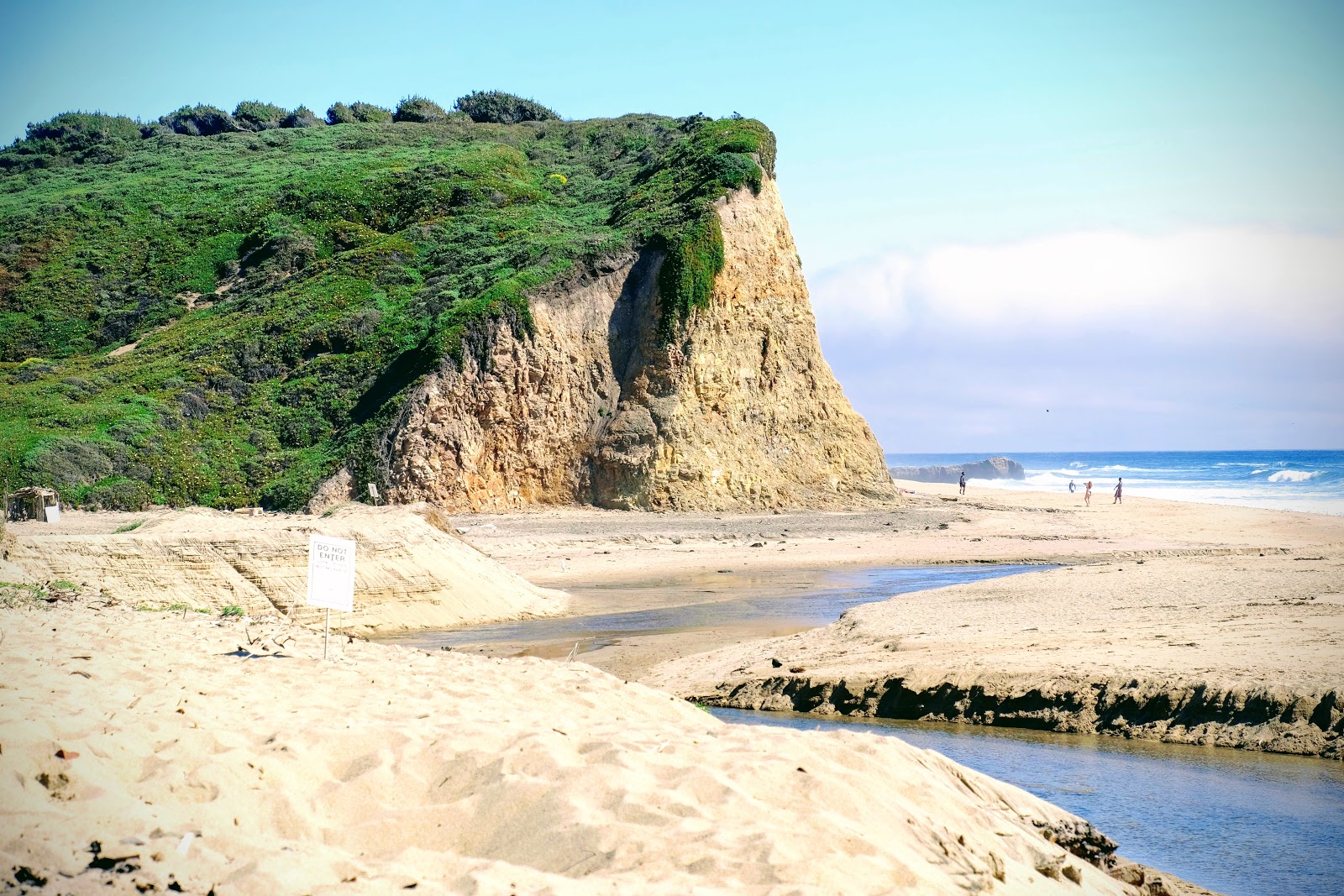 Photo of Davenport Beach with turquoise water surface