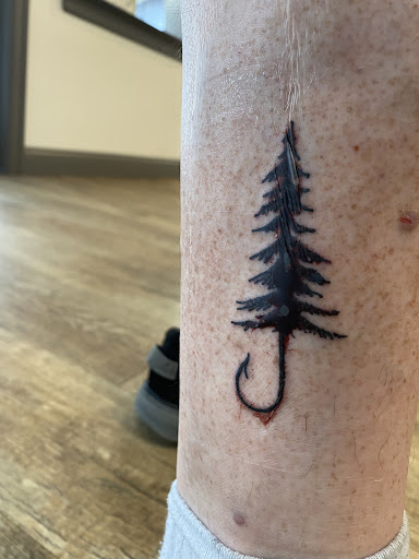 Find under the breast tattoo ideas for your next unique tattoo in Minneapolis at Serenity Tattoo and Piercing