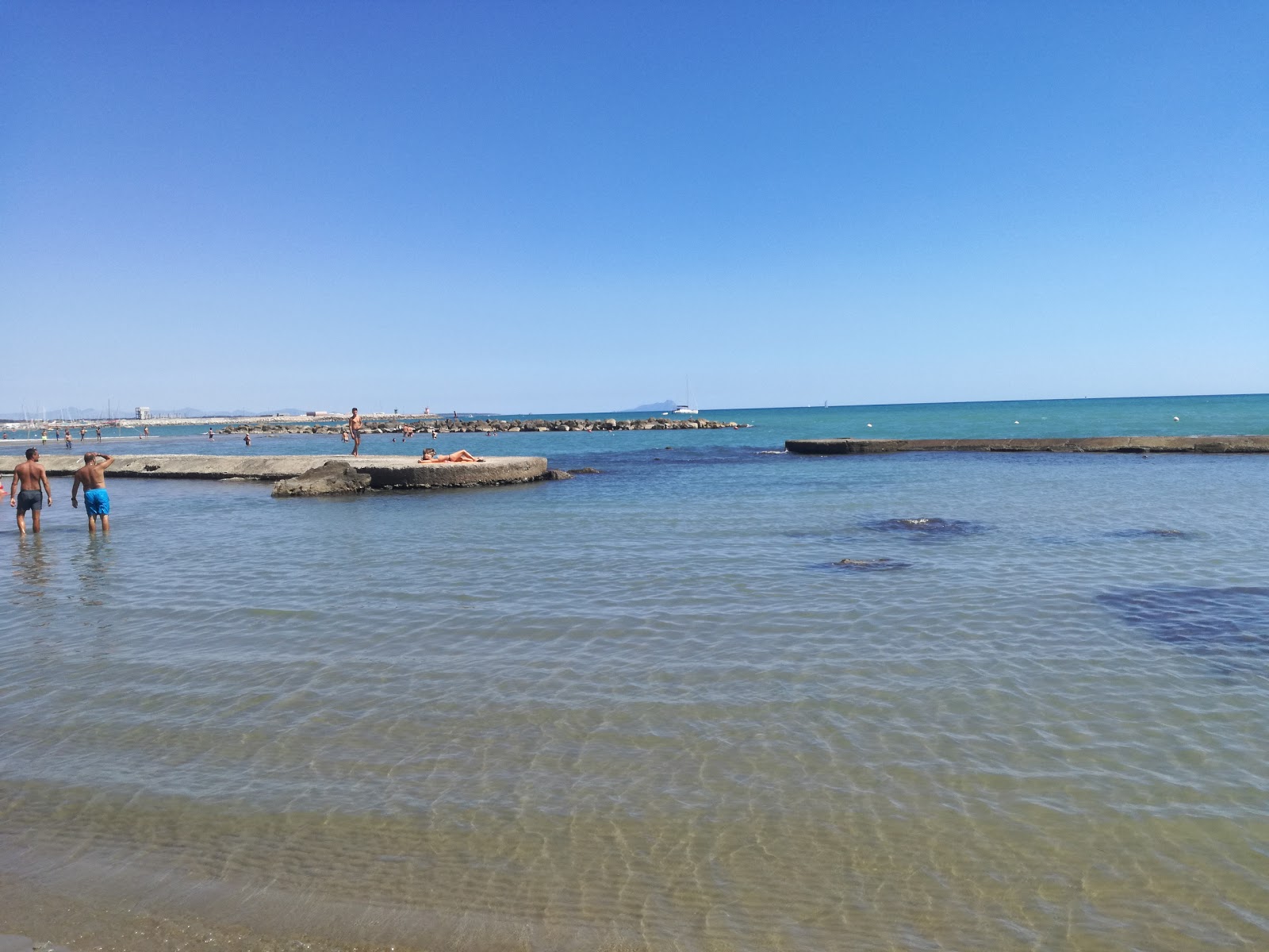 Photo of Nettuno beach with very clean level of cleanliness