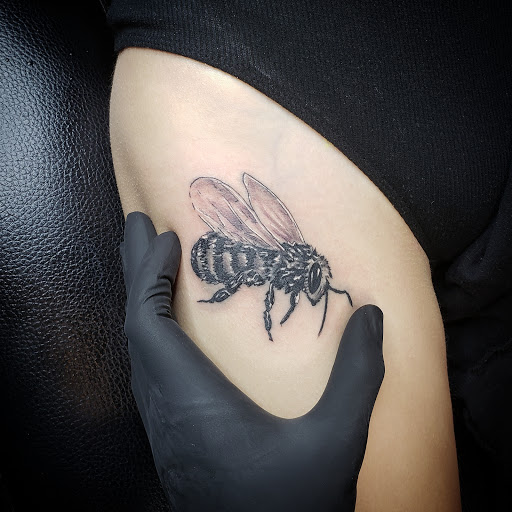 Explore 4 leaf clover tattoo ideas, creative tattoo ideas in Debary, available at Divine Line Tattoos