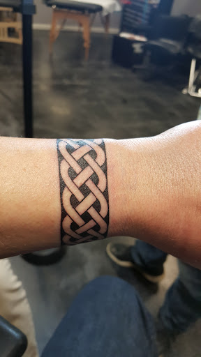 Explore women's back tattoo ideas, creative tattoo ideas in Troy, available at The Ink Spot