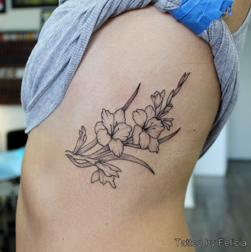 Explore twin tattoos ideas, creative tattoo ideas in Fort Myers, available at Tiger Lotus Tattoo and Piercing