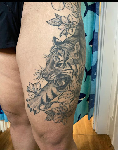 Find time clock tattoo ideas for your next unique tattoo in Bothell at Hometown Tattoo