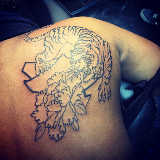 Explore nezuko tattoo ideas, creative tattoo ideas in Warrenville, available at UpRise Tattoos