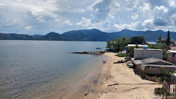 Fora Beach'in fotoğrafı düz bir kıyı şeridi ile birlikte