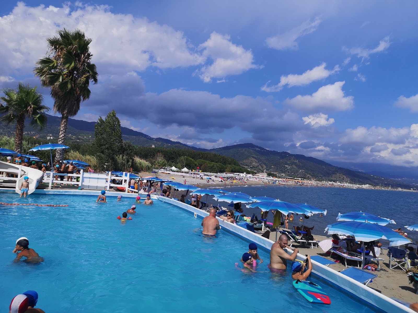 Foto av Bussentino port beach med rymlig strand