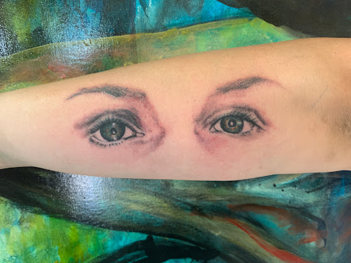 Explore rose and skull tattoo ideas, creative tattoo ideas in Sheridan, available at Cutthroat Art and Tattoo Studio