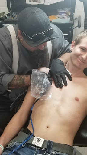 Tattoo Shop «Ink Slingers», reviews and photos, 1355 E Kearney St, Springfield, MO 65803, USA