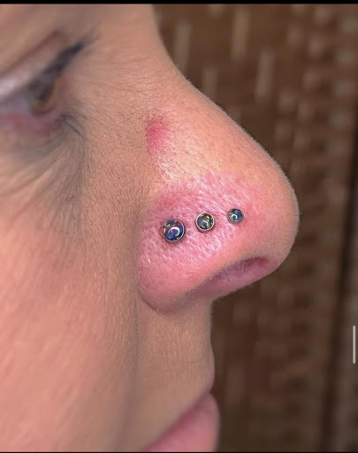 Explore american football tattoo ideas, creative tattoo ideas in Harrisonburg, available at Alley Cat Tattoo