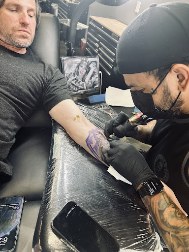 Explore hunter tattoo ideas, creative tattoo ideas in Dallas, available at Sinners Tattoo Studio and Supply