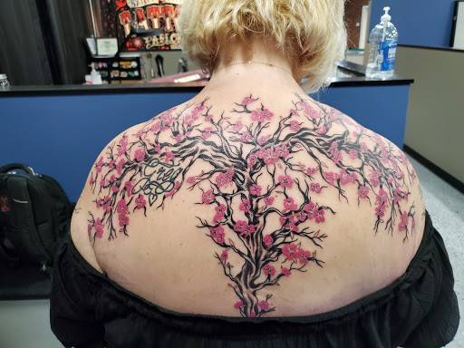 Tattoo Shop «Almighty Tattoo ( Under new ownership now Loyalty Tattoo Company!!!!)», reviews and photos, 5337 S Dort Hwy, Flint, MI 48507, USA