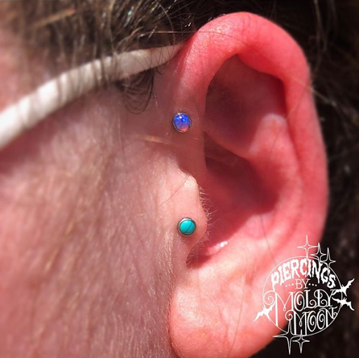 Explore back hand tattoo ideas, creative tattoo ideas in Oshkosh, available at Piercings by Molly Moon at 920 Tattoo and Piercing
