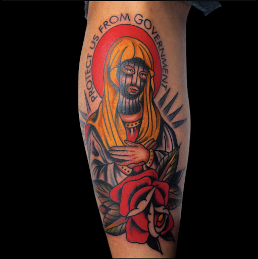 Find face tattoo idea for your next unique tattoo in Johnson City at Gold Cross Tattoo Co.