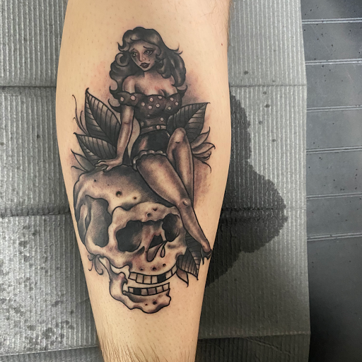 Explore pink ribbon tattoo ideas, creative tattoo ideas in Norwalk, available at Saloon 13 LLC