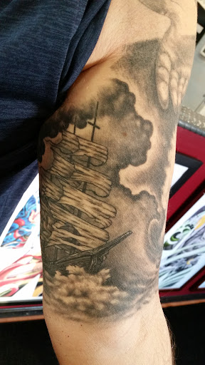 Explore dog ears tattoo ideas, creative tattoo ideas in Puyallup, available at The Tattoo Shop