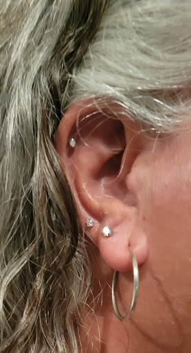 Explore female face tattoo ideas, creative tattoo ideas in Seaside Heights, available at Ocean Seven Body Piercing and Henna Tattoos