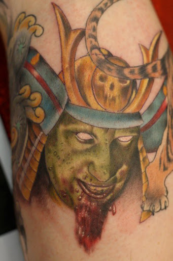 Explore mens back tattoo ideas, creative tattoo ideas in Des Moines, available at Skin Kitchen Tattoo