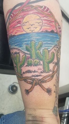 Explore astronaut tattoo ideas, creative tattoo ideas in Fort Mohave, available at RedRum Tattoo & Body Piercing Co.