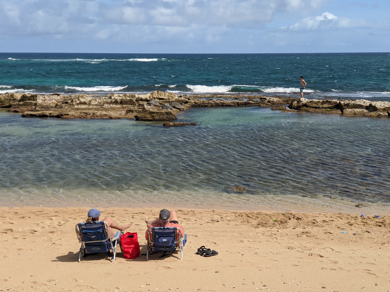 Kuau Cove Beach'in fotoğrafı çok temiz temizlik seviyesi ile