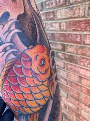 Explore chrysanthemum tattoo november birth flower tattoo ideas, creative tattoo ideas in Richmond, available at Seven Hills Tattoo LLC