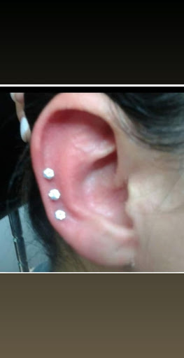 Explore tattoo cover up ideas for ring finger, creative tattoo ideas in Hialeah, available at Allstar Tattoo & Body piercing