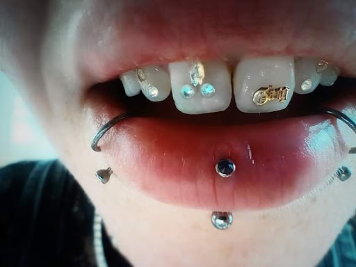 Explore small goth tattoo ideas, creative tattoo ideas in Sioux City, available at Addictive Tattoo-Piercing