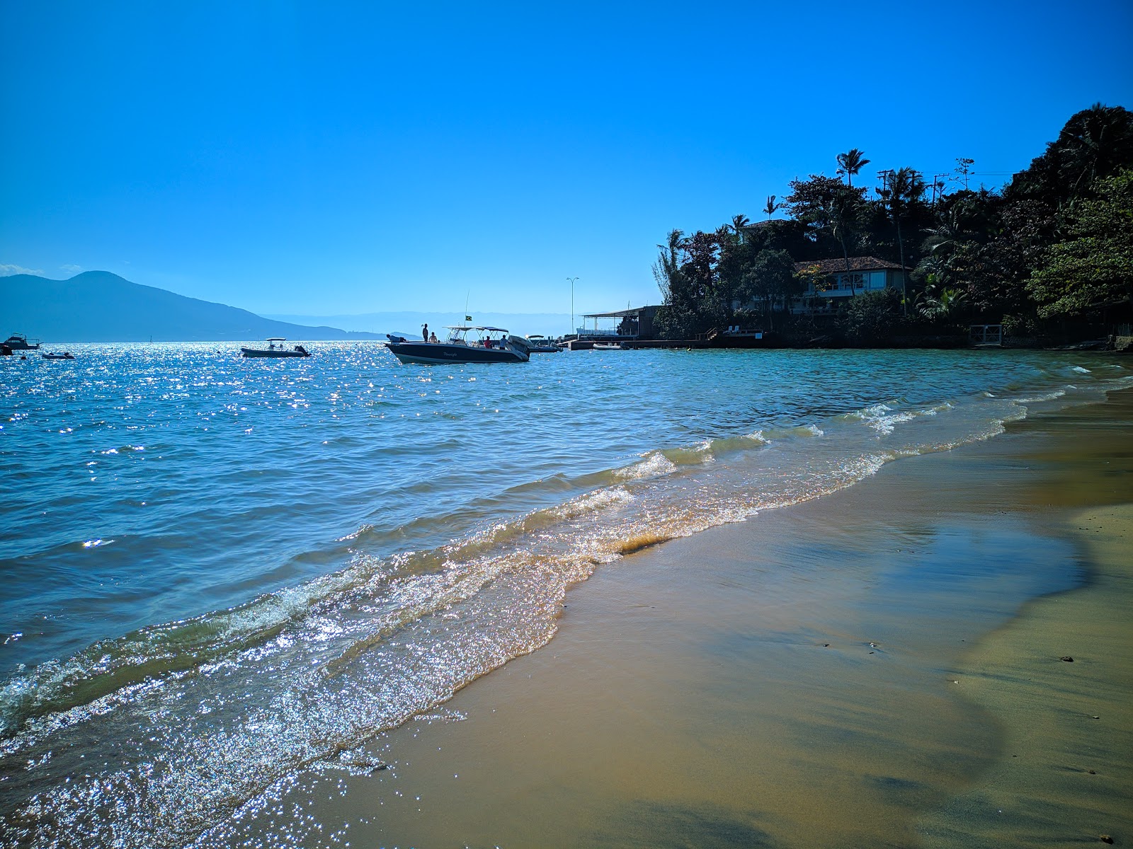 Foto de Praia de Santa Teresa e o assentamento