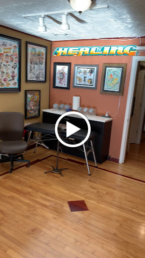 Explore guitar pick tattoo ideas, creative tattoo ideas in Minneapolis, available at Nokomis Tattoo