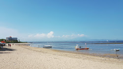 Foto av Sindhu Beach med lång rak strand