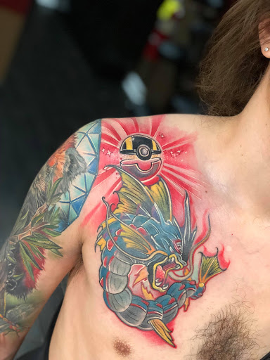 Explore male back tattoo ideas, creative tattoo ideas in Rome, available at Body Canvas