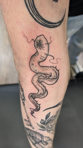 Explore let go tattoo ideas, creative tattoo ideas in Omaha, available at Ironwood Ink