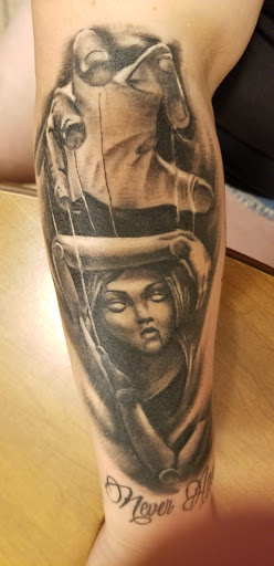 Explore black cover up tattoo ideas, creative tattoo ideas in Belton, available at Not Just Ink Tattoos And Body Piercing