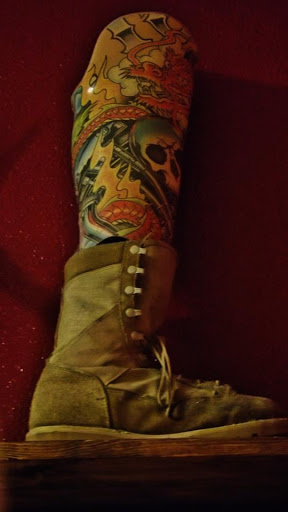 Explore afro tattoo ideas, creative tattoo ideas in Redding, available at The Salty Sloth Tattoo