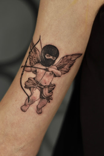 Explore dark humor tattoo ideas, creative tattoo ideas in Southfield, available at Enki Tattoo