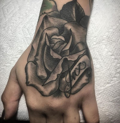Explore flower tattoo ideas on arm, creative tattoo ideas in San Diego, available at Sideshow Tattoo and Piercing