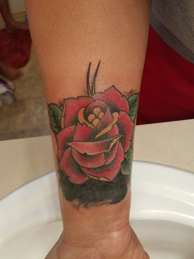 Explore neck word tattoo ideas, creative tattoo ideas in Tacoma, available at Garfield Street Tattoo Co