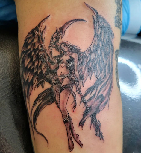 Explore alpha omega tattoo ideas, creative tattoo ideas in Passaic, available at District 36 Tattoo Parlor