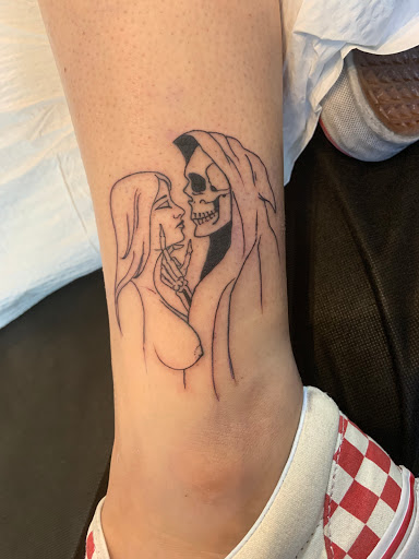 Explore tattoos inner bicep ideas, creative tattoo ideas in Providence, available at The Torchbearer Tattoo
