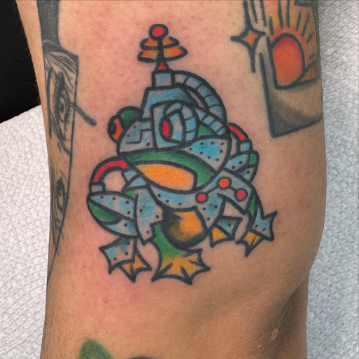 Explore flower tattoo cover up ideas, creative tattoo ideas in Green Bay, available at Sanctuary Tattoo Studio