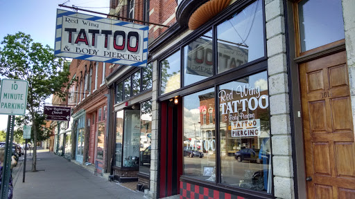 Explore family over everything tattoo ideas, creative tattoo ideas in Winona, available at Red Wing Tattoo