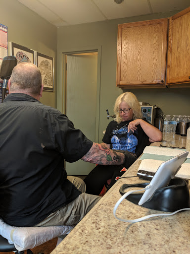 Find wolf tattoo idea for your next unique tattoo in East Stroudsburg at Third Dimension Tattoo