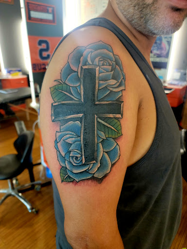 Explore irish cross tattoo ideas, creative tattoo ideas in Syracuse, available at Cuse Ink