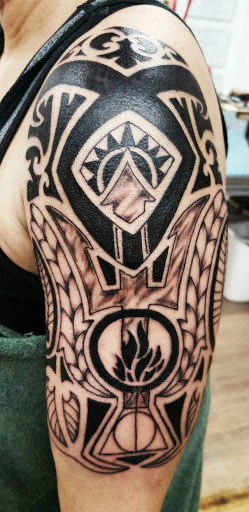 Explore tattoo ideas chest piece, creative tattoo ideas in Galesburg, available at Hawks Tattoos