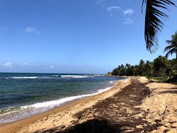 Playa Secret Beach'in fotoğrafı geniş bir kıyı şeridi ile birlikte