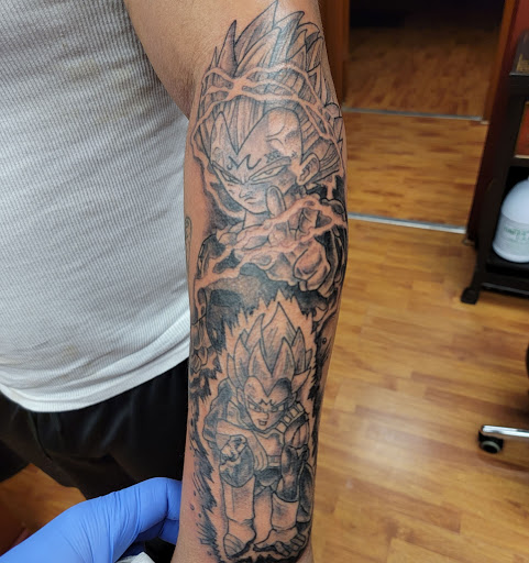 Tattoo Shop «Liquid Swordz», reviews and photos, 27 N Washington St, Ypsilanti, MI 48197, USA