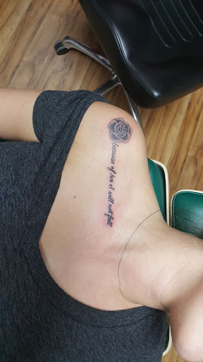 Explore men's family sleeve tattoo ideas, creative tattoo ideas in Owosso, available at Expressions Body Art Studio