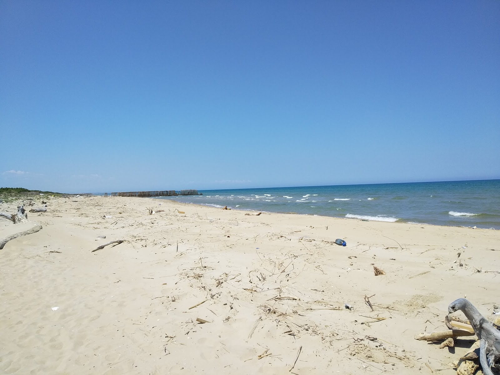 Foto van Spiaggia di Cauto met laag niveau van netheid